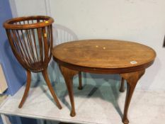 A jardinière stand and an oval occasional table