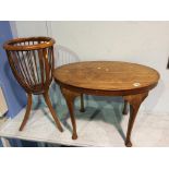 A jardinière stand and an oval occasional table