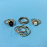 Four 9ct gold rings, 13 grams