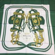 A green ground silk Hermes scarf