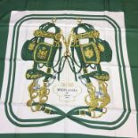 A green ground silk Hermes scarf