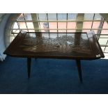 An Oriental carved coffee table