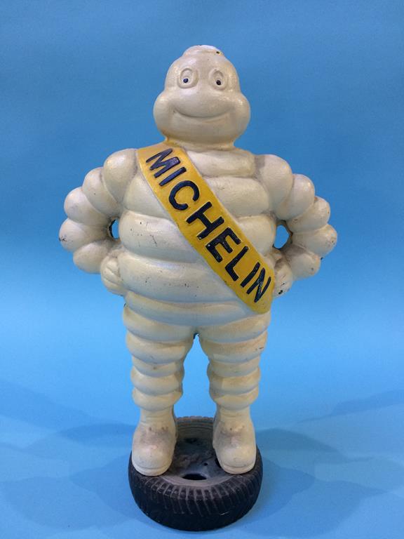 A cast 'Michelin Man' figure