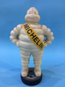 A cast 'Michelin Man' figure