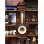 A walnut cased barometer