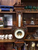 A walnut cased barometer