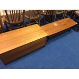 A teak blanket box and a coffee table