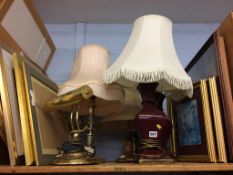 A quantity of table lamps and prints