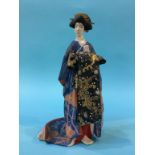 A Japanese figure of a Geisha