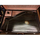 A boxed table harp