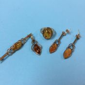 A gold mounted amber ring etc.