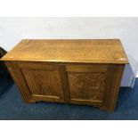 An oak two door cabinet