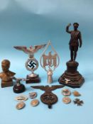 A collection of reproduction German World War II figures and busts etc.