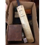 A box of assorted, to include a signed cricket bat etc.