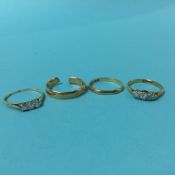 Four 18ct gold rings, 9.6 grams