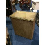 A gold Lloyd Loom linen box