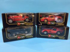 Four boxed Burago Die Cast cars