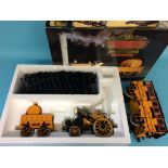 A boxed Hornby railway 'Stephenson's Rocket' and a boxed G104 coach (2)