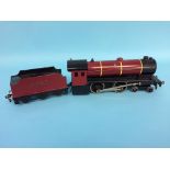 A '0' gauge Basset Lowke Limited Enterprise Express 4-4-0, 6285, with red livery