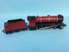 A '0' gauge Basset Lowke Limited Enterprise Express 4-4-0, 6285, with red livery