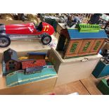 A collection of tin plate model railway buildings