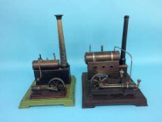 Two spirit fired model engines, labelled 'Made in Germany', 28cm width x 33cm height