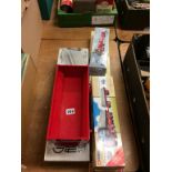 Five boxed Die Cast models and a model cart