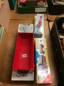 Five boxed Die Cast models and a model cart