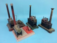 Four various spirit fed model engines, two stamped D. C. Germany (4)