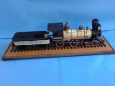 An American Exhibition Standard live 3 ½ inch gauge steam train, 'A. & G. W., with case. 114cm