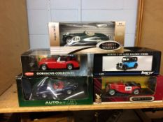 Five boxed Die Cast model cars