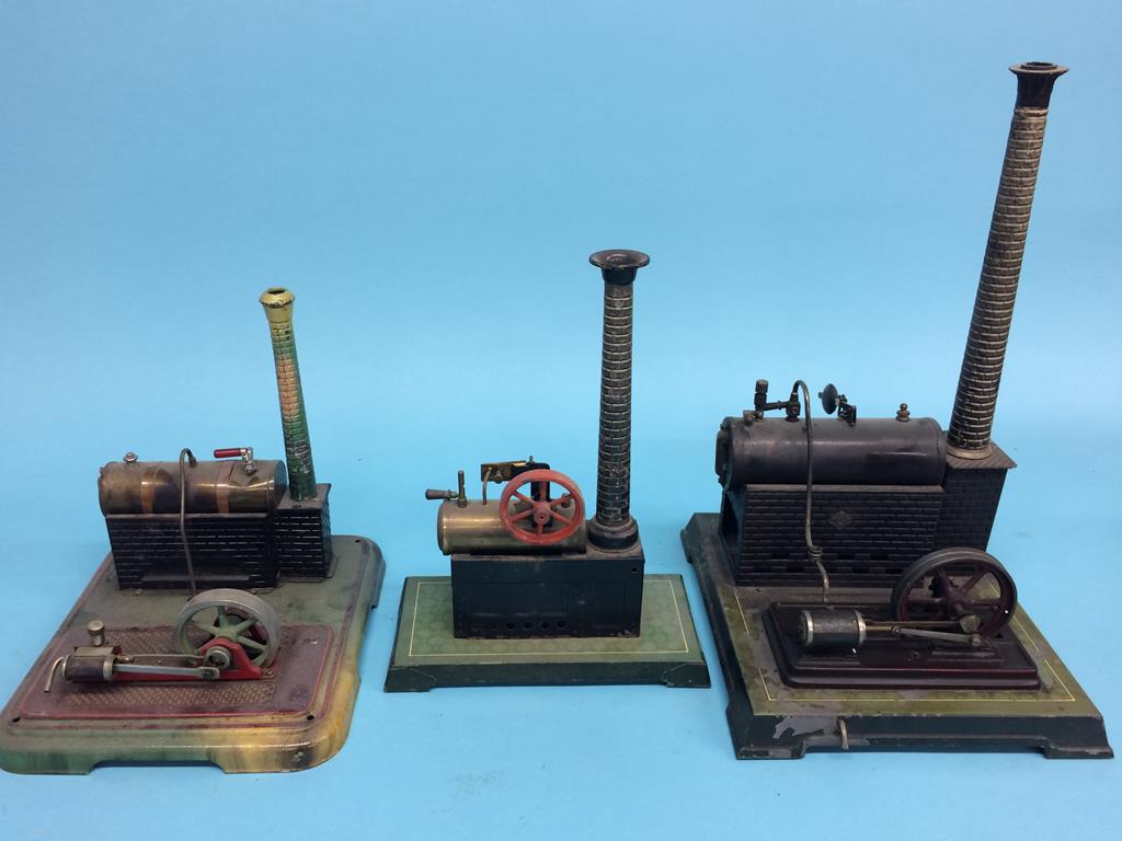 Three spirit fired model engines, one stamped G.B.N., another stamped B.W. Germany and one