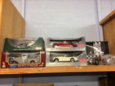 Four boxed Die Cast cars and two others