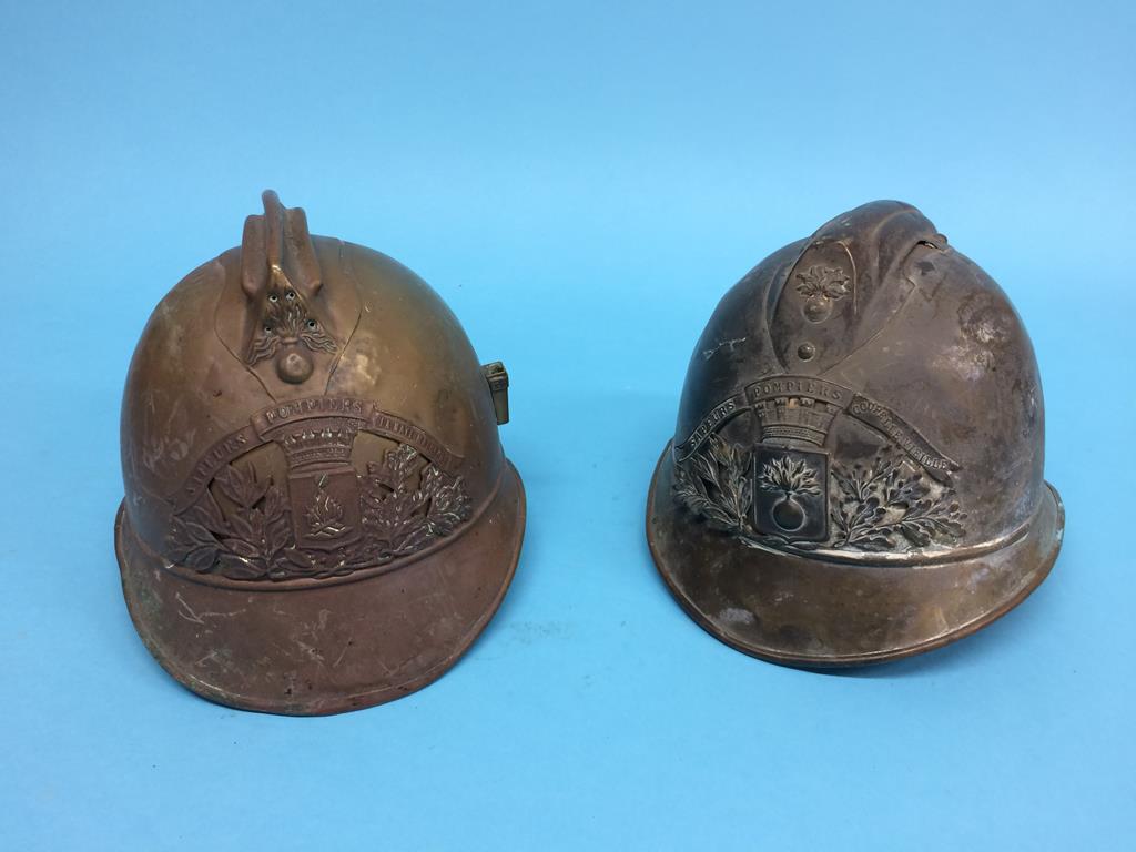 Two French Fire helmets, 'Pompiers'