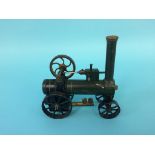 A miniature traction engine, 14cm wide, 14cm height