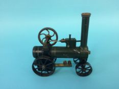 A miniature traction engine, 14cm wide, 14cm height
