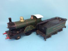 A live 3 ½ inch gauge Great Western locomotive, 2-4-0, with green livery, 99cm (overall size)