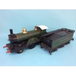 A live 3 ½ inch gauge Great Western locomotive, 2-4-0, with green livery, 99cm (overall size)