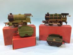 Two boxed Hornby '0' gauge locomotives, 50153 and 1842, with two tenders (one boxed)