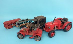 A box of reproduction tractors, carriages etc.