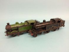 A clockwork 1 ½ inch gauge L. & N. W. R. '44' locomotive, with black livery, 40cm length and a 1 ½
