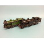 A clockwork 1 ½ inch gauge L. & N. W. R. '44' locomotive, with black livery, 40cm length and a 1 ½
