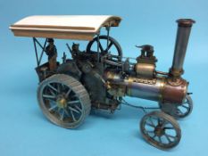 A live 1 inch Minnie steam traction engine. 44cm length