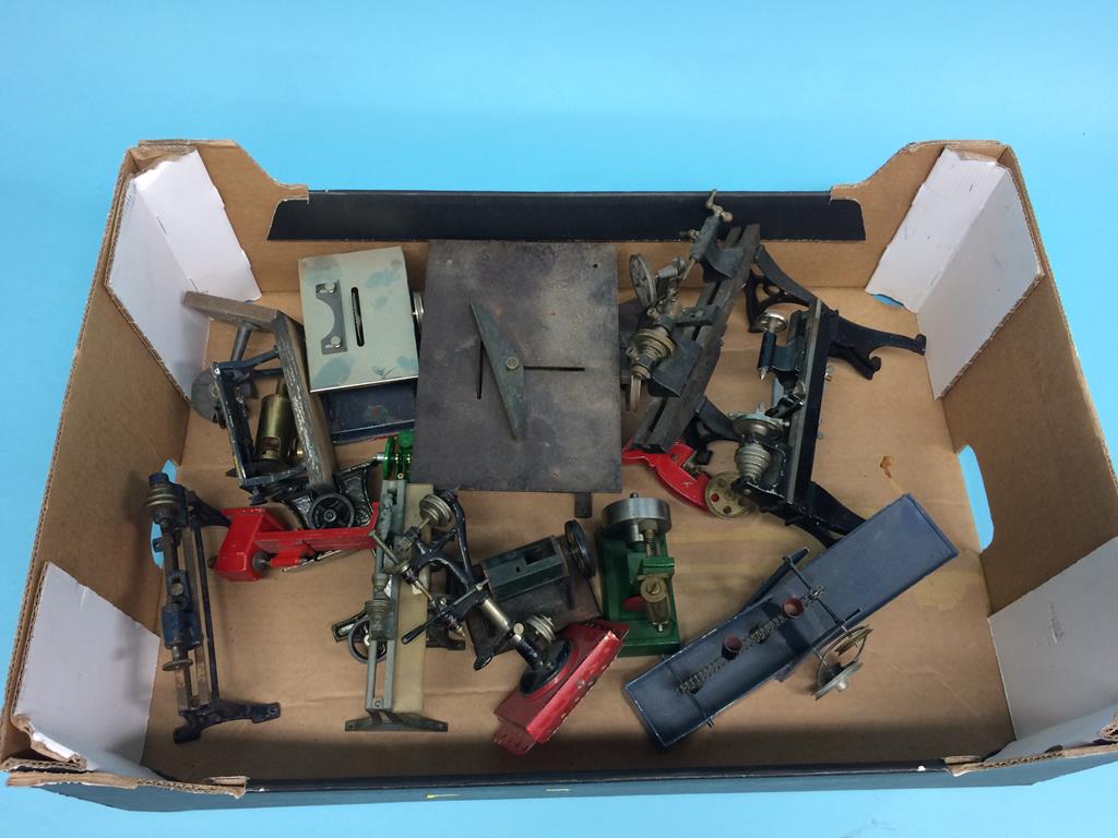 A box of miniature engineering machinery to include; lathes, wood saw, grinder, pillar drills etc.