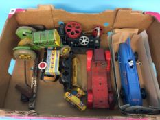 A box containing a Mettoy tractor, model of Bluebird car etc.