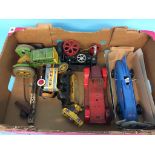 A box containing a Mettoy tractor, model of Bluebird car etc.