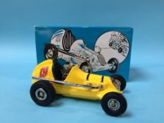 A boxed Thimble Drone Champion Die Cast car