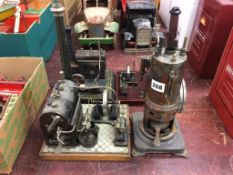 Three tin plate model engines and a part model vertical engine