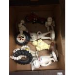 A quantity of reproduction cast figures, Esso, Michelin etc.