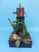 A large single cylinder marine model vertical beam engine, with mounted propeller. 50cm length, 30cm